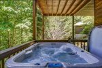 Lower Level Covered Deck Features a Hot Tub
